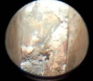 Boroscope view of rusty wall tie