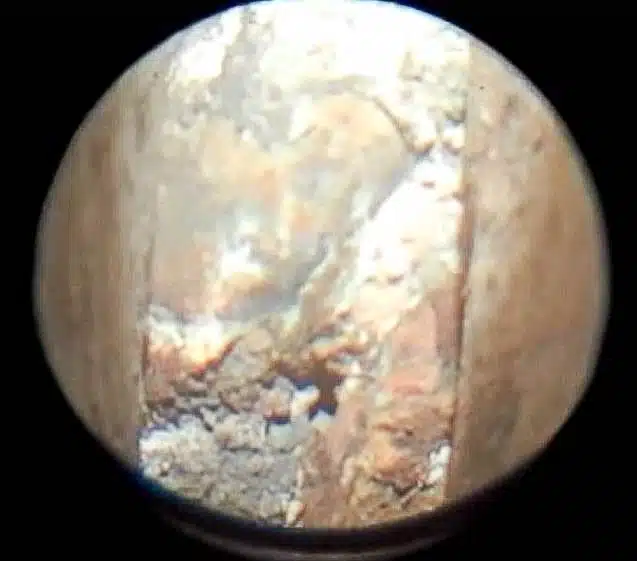 Boroscope view of rusty wall tie