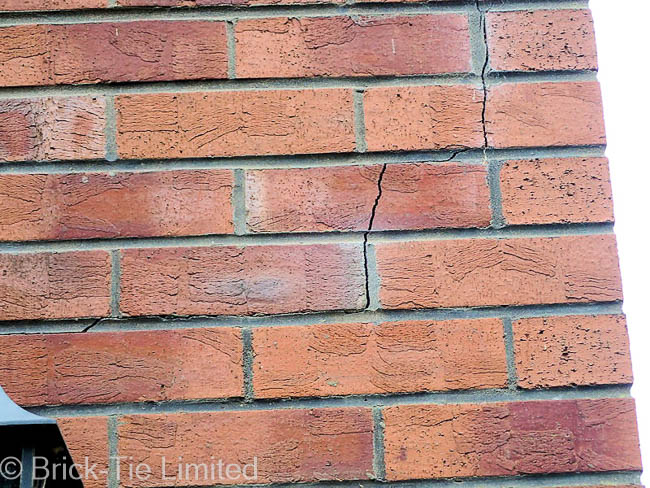 A typical cracks in the brickwork of a new home