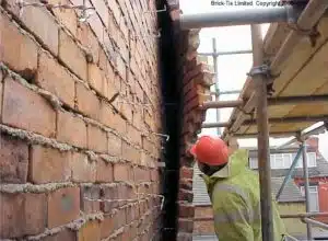 A collapsed wall caused by wall tie corrosion
