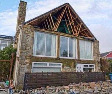 A collapsed gable wall in the north of England