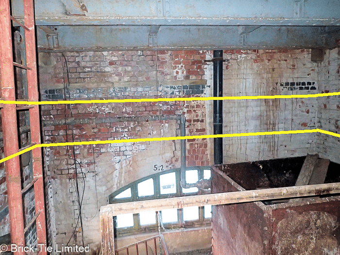 Inside of water tower with cracks in the masonry