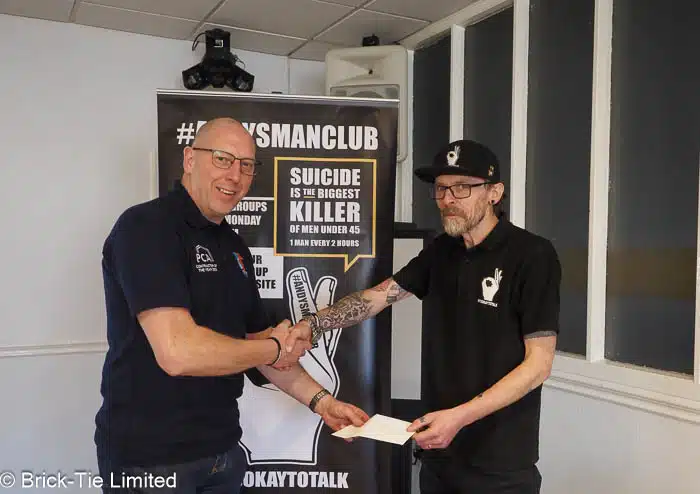 David Gill presents a donation to andysmanclub 